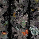 Detailed floral and insect pattern on a black background
