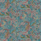 Patterned fabric with dragons and leaves on a teal background